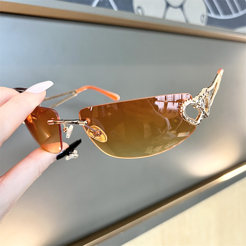 Nieuwe ovale Cat Eye frameloze - Sunglasses Cat Eye recensie en prijs
